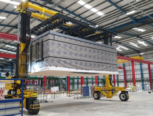 Combilift - Straddle Carrier - handling Modular Component