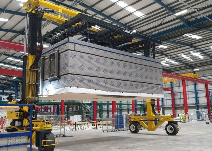 Combilift - Straddle Carrier - handling Modular Component