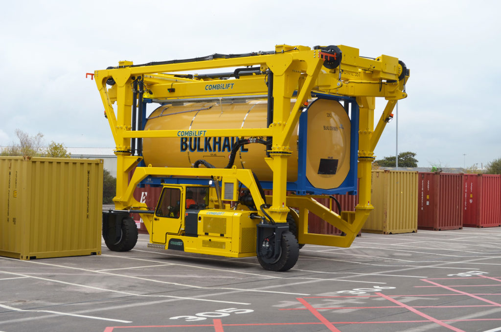 Combilift Straddle Carrier lifting ISO Tanks containing around 24,000 litres of wine