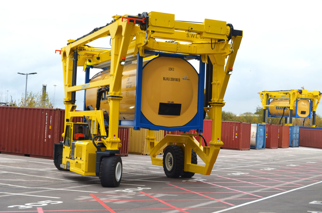 Combilift Straddle Carrier lifting ISO Tanks containing around 24,000 litres of wine